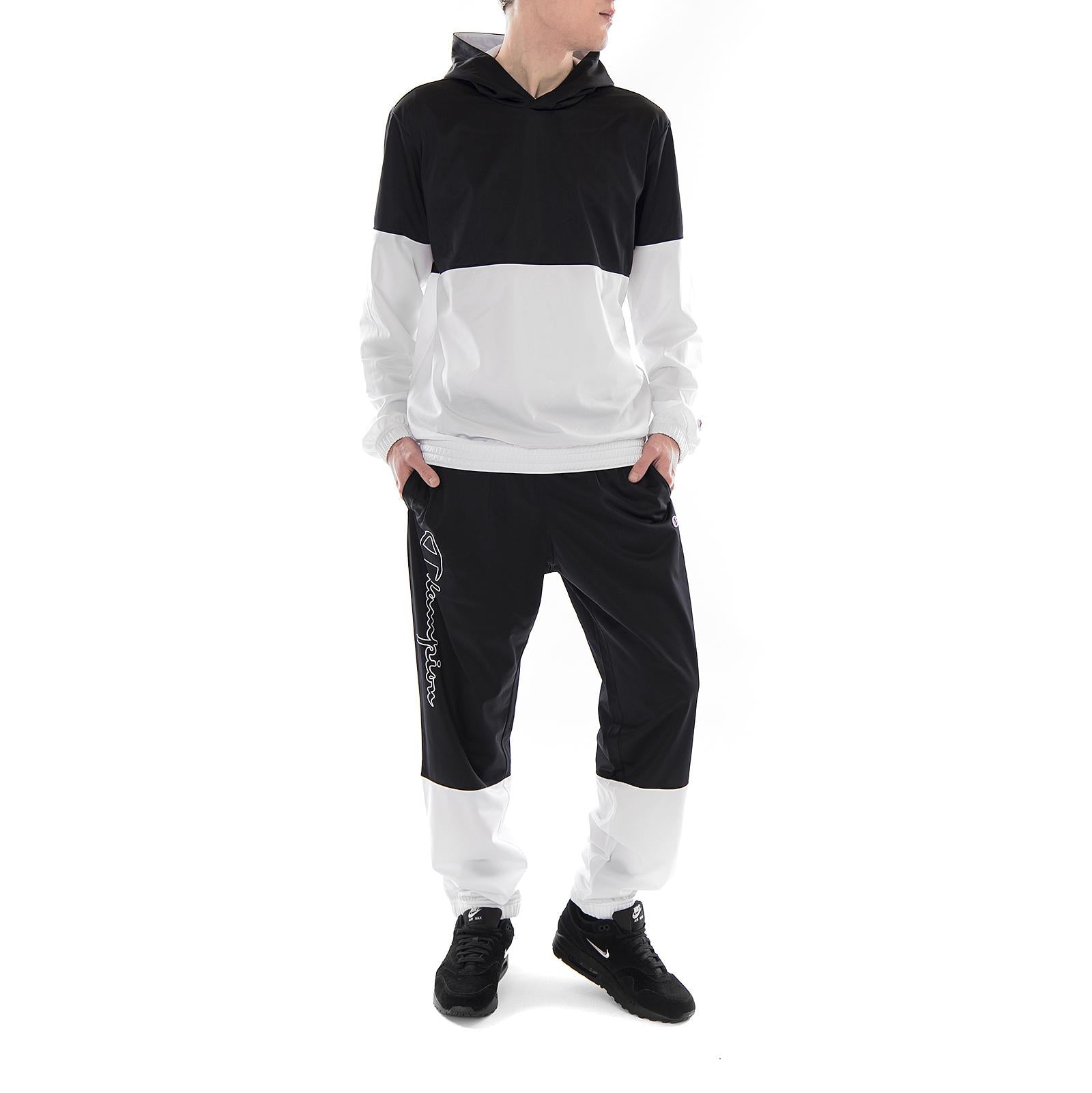 Tracksuit Black / White 211854-KK001  CHAMPION 